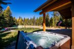 Enjoy this amazing view of the pond from the hot tub at  Retreat at the Pines